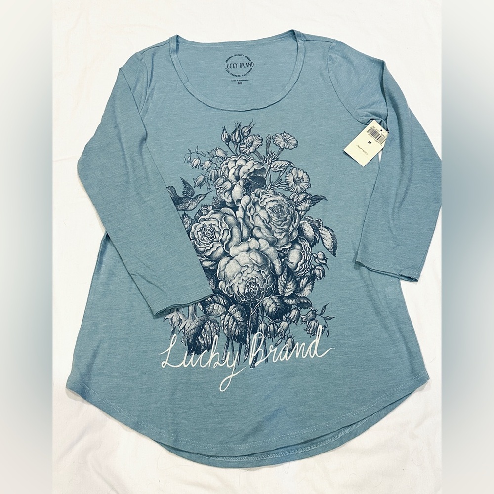 Lucky Brand Women’s Long Sleeve Tee with Retro Flowers graphic Size Med. NWT
